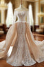 Champagne Mermaid Lace Long Sleeve Backless Train Wedding Dress