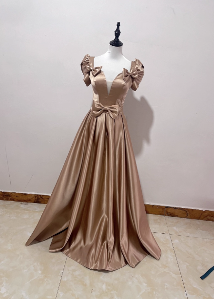 Elegant Champagne Gold Deep V-Neck Bow Satin Long Formal Prom Dress Main image