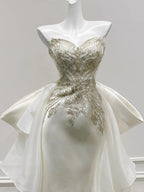 Elegant Ivory Mermaid Strapless Beaded Satin Wedding Dress With Train