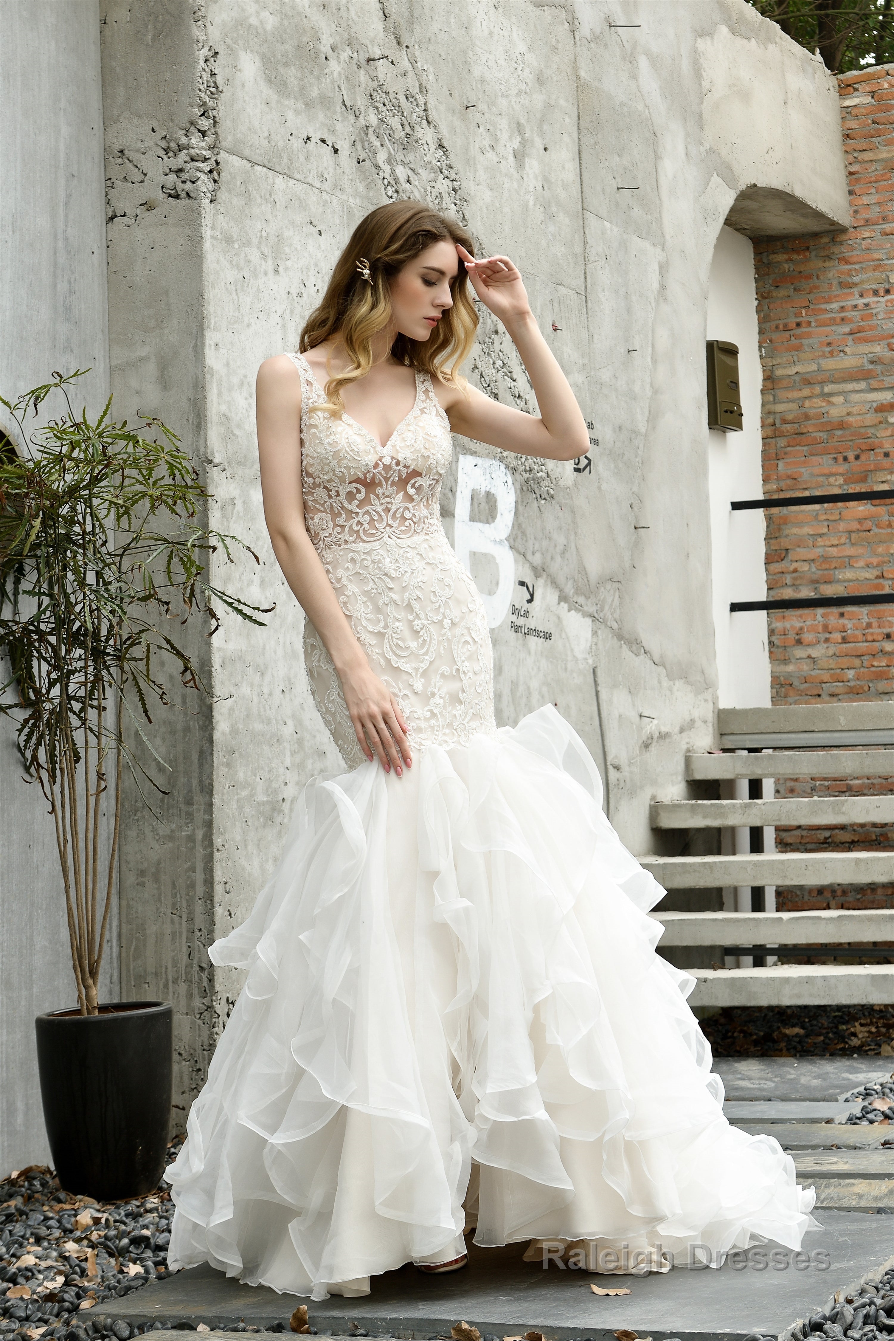 Mermaid Sleeveless V-Neck Wedding Dresses Sweep Train Ruffles Beaded Main image