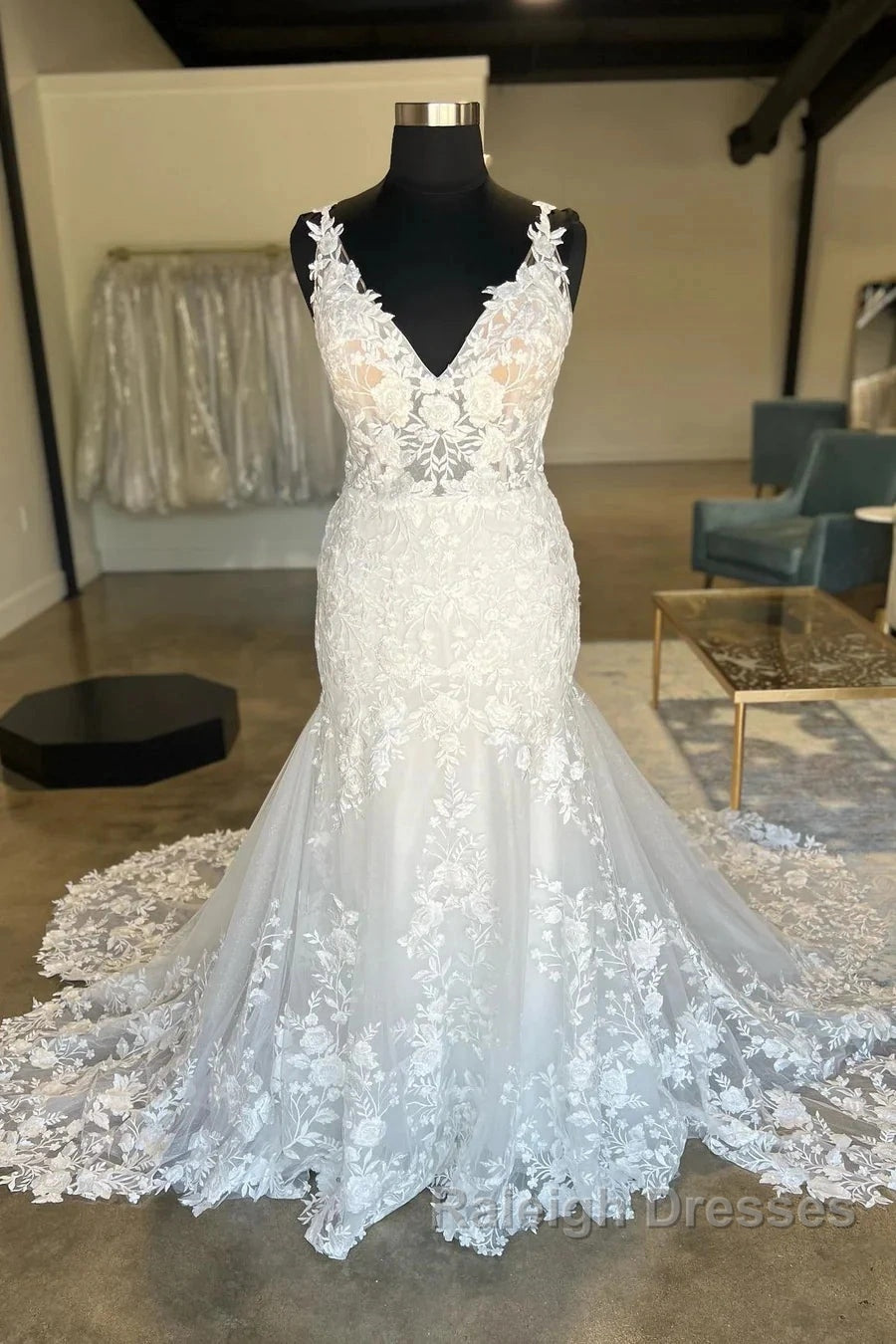 Plunging V Neck Appliques Trumpet Sweeping Wedding Dresses