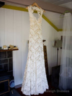 Sleeveless Lace V-Neck Court Train Wedding Dress